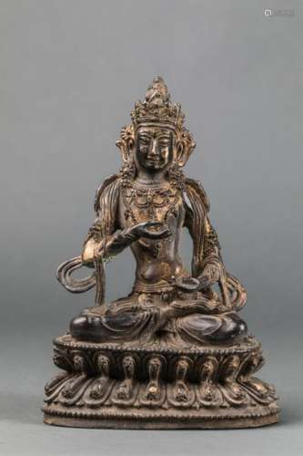 Bouddha Maitreya assis en dhyasana sur une base lo...