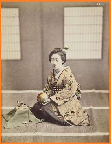 PHOTOGRAPHIE DONNANT A VOIR UNE JEUNE JAPONAISE / ...