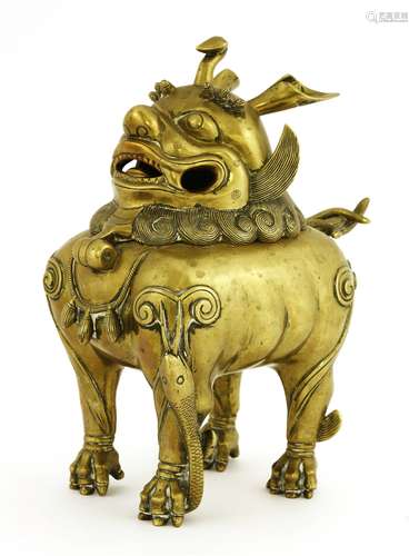 A Chinese brass incense burner, 17th-18th century, in the form of a luduan, the hinged head above a ...