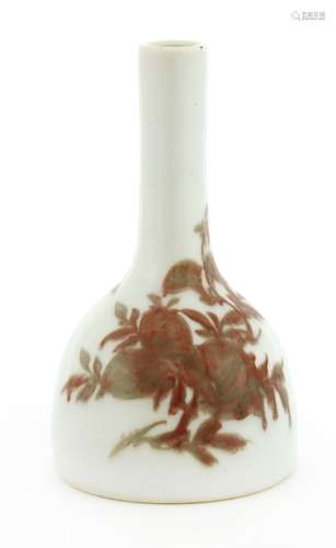 A Chinese iron-red vase, Qing dynasty (1644-1911), of bell form with a long straight neck, painted ...