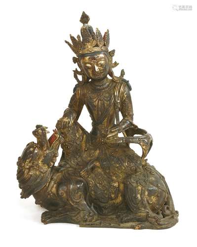 A Chinese gilt bronze bodhisattva, Qing dynasty (1644-1911), wearing elaborate garments and beaded ...