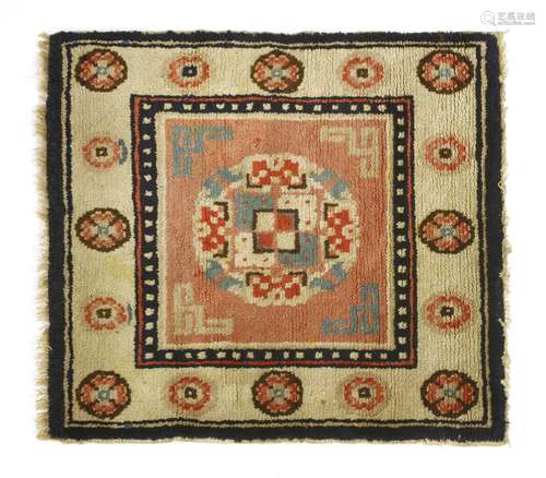 Two Chinese Ningxia mats, one decorated with a square, with a roundel in the centre, and surrounded ...