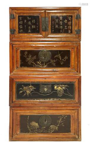 A four section Chinese cabinet, early 20th century, each section altered from a trunk with two ...