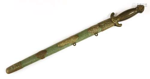 A Chinese double sword, late Qing dynasty, each with a horn handle, the sheath in shagreen with ...