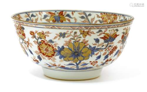 A Chinese Imari punch bowl, early 18th century, painted with sprigs of flowers in iron-red and blue ...