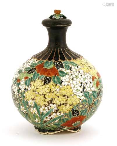 A Japanese vase and cover, Meiji period (1868-1912), the globular body on lobed feet, painted in ...