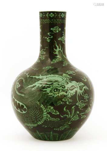 A Chinese famille noire vase, of globular form with a short straight neck, painted with a dragon ...