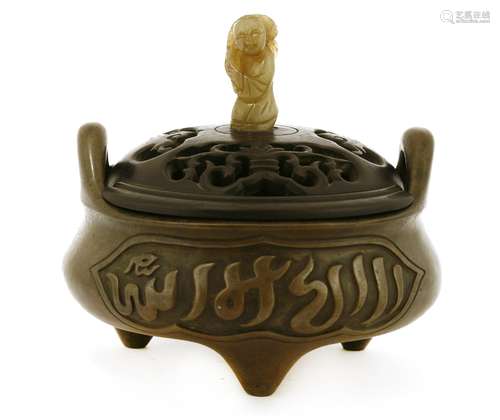 A Chinese bronze incense burner, Qing dynasty (1644-1911), of squat form on three stub feet, the ...