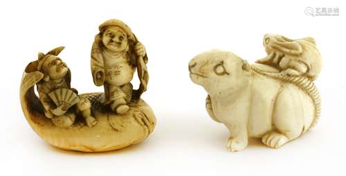 Two Japanese ivory netsuke, c.1920, one with Daikokuten and Ebisu on the back of a carp, signed ...