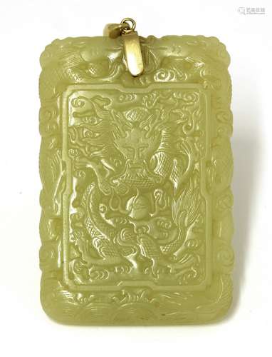 A Chinese yellow jade plaque, Qing dynasty (1644-1911), of rectangular form, one side carved with a ...