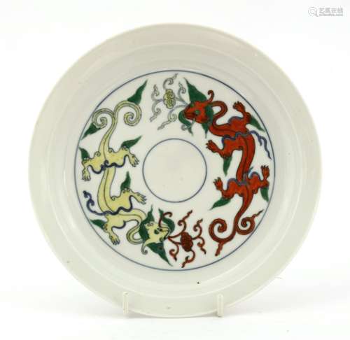 A Chinese porcelain doucai cup stand, Kangxi/Yongzheng (c.1720), of circular form with a slightly ...