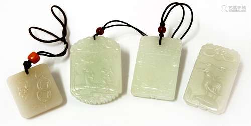 Four Chinese jade pendants, 20th century, of rectangular form, one carved with a cockerel, one with ...