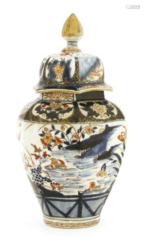 A Japanese Imari jar and cover,  17th century, of hexagonal form, painted with mandarin ducks in a ...