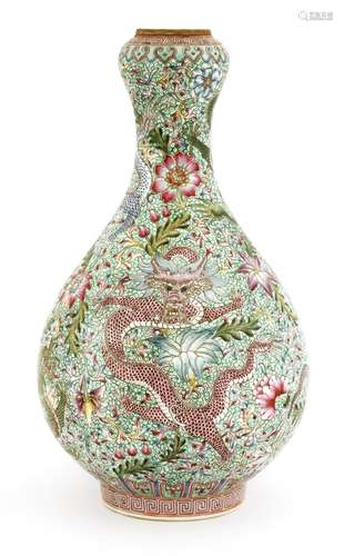 A Chinese famille rose garlic mouth vase, painted with dragons amongst scrolling flowers against a ...