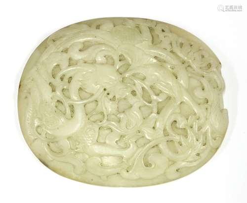 A Chinese jade carving, Qianlong (1736-1795), of oval form, carved in low relief with a dragon ...