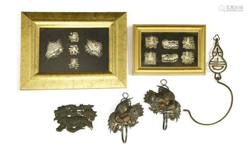 A collection of Chinese silver, late Qing dynasty, comprising: a pair of silver curtain holders, in ...