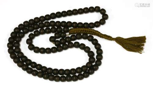 A string of Chinese wooden beads, of aloeswood, each of the one hundred and eight beads in rounded ...