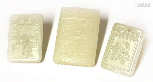 Three Chinese white jade plaques, 20th century, of rectangular form, each engraved with an ...