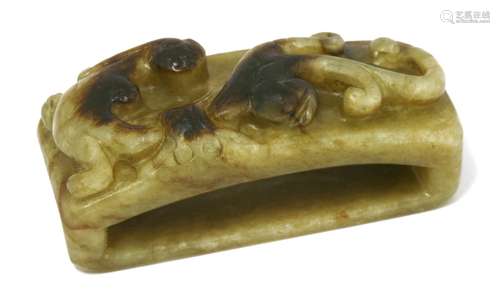 A Chinese jade belt buckle, Yuan dynasty (1279-1368), of rectangular form carved with a chilong, ...