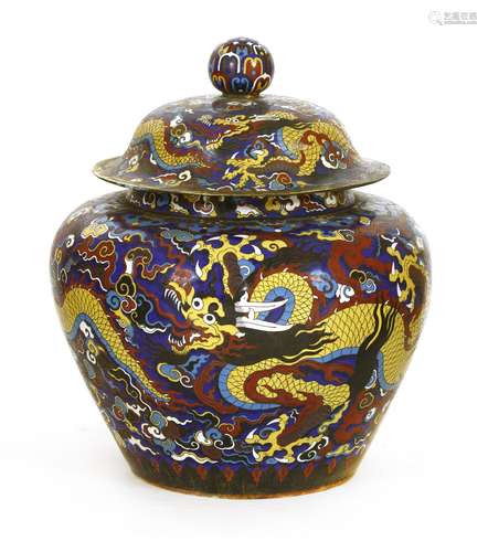 A Chinese cloisonné jar and cover, 19th/20th century, with a vigorous five-clawed dragon with open ...