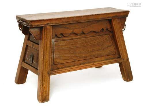 A Chinese wooden stool, early 20th century, with rectangular top on spreading legs, two drawers to ...