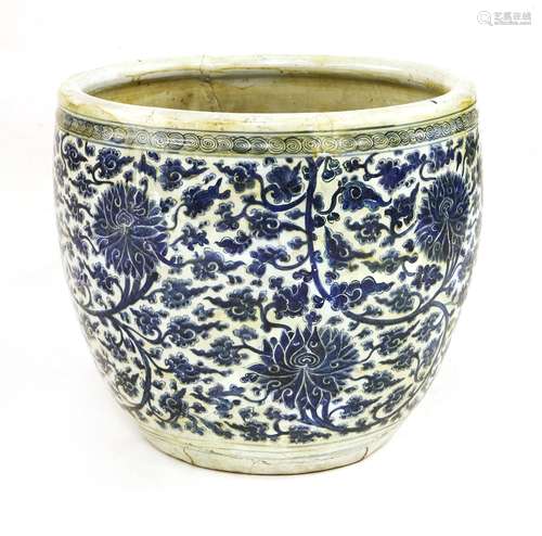 A Chinese blue and white fish bowl, Kangxi (1662-1722), painted with scrolling lotus below a ...