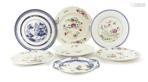 A collection of Chinese blue and white and famille rose plates, 18th/19th century, painted with ...