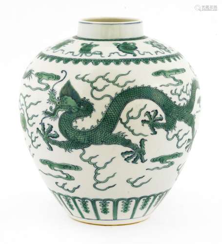 A Chinese doucai jar, Daoguang (1821-1850), painted with two dragons chasing flaming pearls in ...