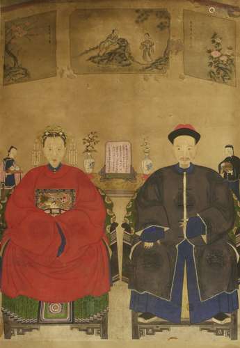 A large Chinese ancestor portrait painting, early 20th century, of an elderly couple seated on ...