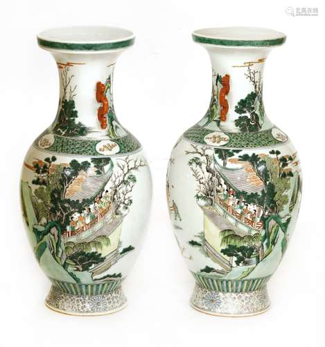 A pair of Chinese famille verte vases, 19th/20th century, each of baluster form on a tapering ...