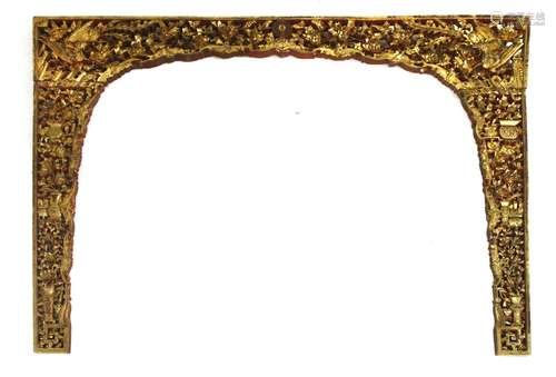 A Chinese gilded wood bed frame, 19th century, in three parts, the top section pierced and carved ...