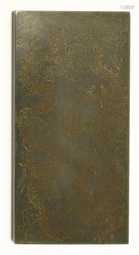 A Chinese jade plaque, engraved with two dragons chasing a flaming pearl, the other side engraved ...