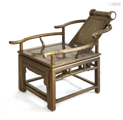 A Chinese reclining moon-gazing chair, late 19th century, the cylindrical top rail inset with ...