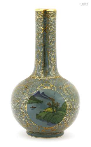 A Chinese porcelain vase, 1954, painted with roundels of landscapes surrounded by scrolling flowers ...