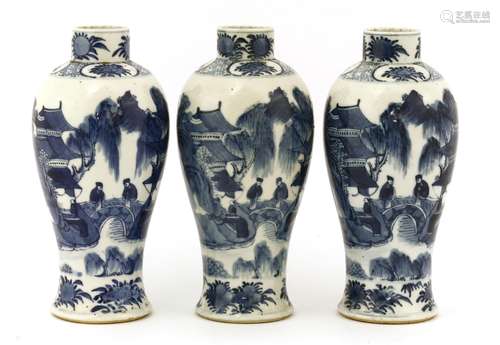 A collection of three Chinese blue and white vases, c.1900, of baluster form, painted with two ...