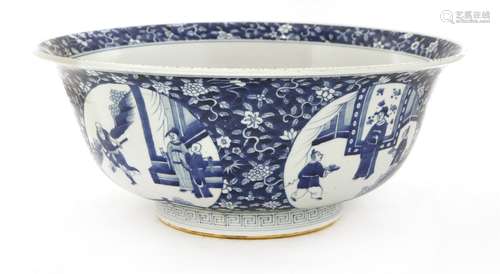 A Chinese blue and white punch bowl, late Qing dynasty, of circular form with a splayed mouth, the ...