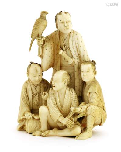 A Japanese ivory okimono, Meiji period (1868-1912), carved with four men, comprising a samurai ...