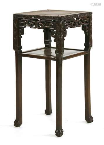 A Chinese vase stand, 19th century, the square top above a pierced apron carved with key fret below ...