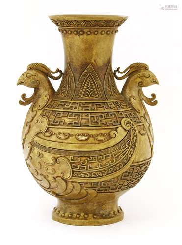 A Chinese bronze vase, of globular form with a splayed mouth and foot, modelled with two phoenixes, ...