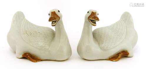 A pair of Chinese porcelain ducks, 19th century, each naturalistically modelled with their legs ...