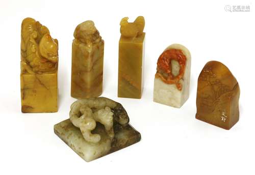 A collection of Chinese seals, 20th century, comprising: one jade, with a chilong on a square base, ...