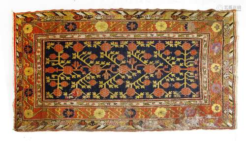 A collection of Chinese Hotan rugs, comprising: a rectangular example with floral decoration, 137 x ...