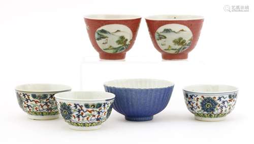 A collection of Chinese tea bowls, probably Republic period, comprising three doucai, painted with ...