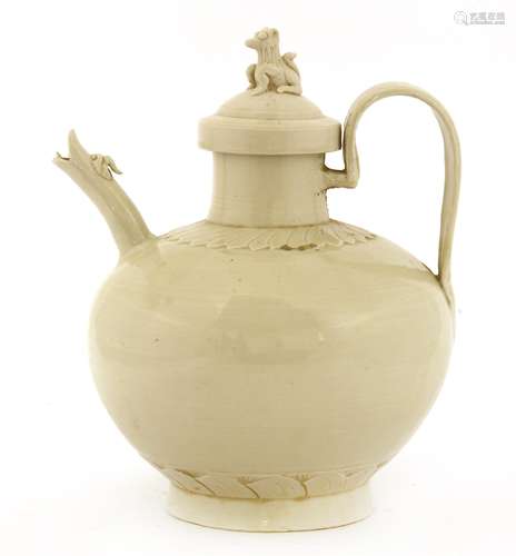 A Chinese Ding ware ewer and cover, Jin dynasty (1115-1234), of baluster form on a raised foot, ...