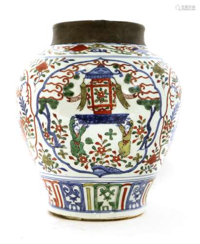 A Chinese wucai pot, of baluster form, painted with boys carrying a lantern in shaped panels ...