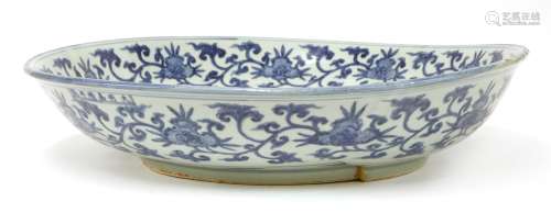 A Chinese blue and white charger, Jiajing (1522-1566), heavily potted and of shallow tapering form ...