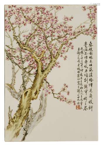 A Chinese ceramic plaque,  painted with a blossoming prunus tree, inscribed, dated and signed,  ...