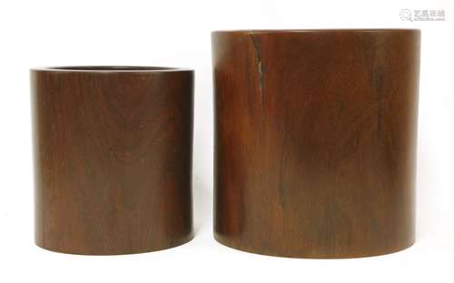 Two Chinese wood bitong, each of plain cylindrical form,26.5 and 22cm high (2)木笔筒 一组两件