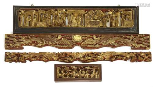 A Chinese gilded wooden panel, early 20th century, pierced and carved with officials on horseback ...