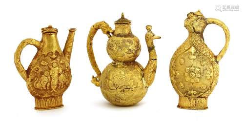 A Chinese gold ewer and cover, of double gourd form, decorated with lotus in shaped panels ...